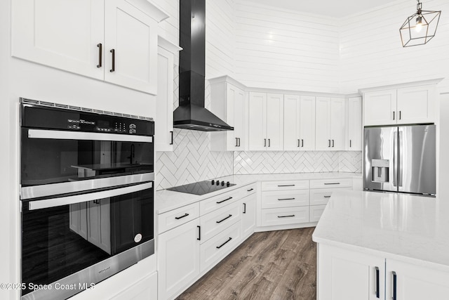 278 Stallion St, Palm Bay, FL 32909 - kitchen with appliances with stainless steel finishes, wall chimney range hood, white cabinetry, tasteful backsplash, and dark wood-style floors