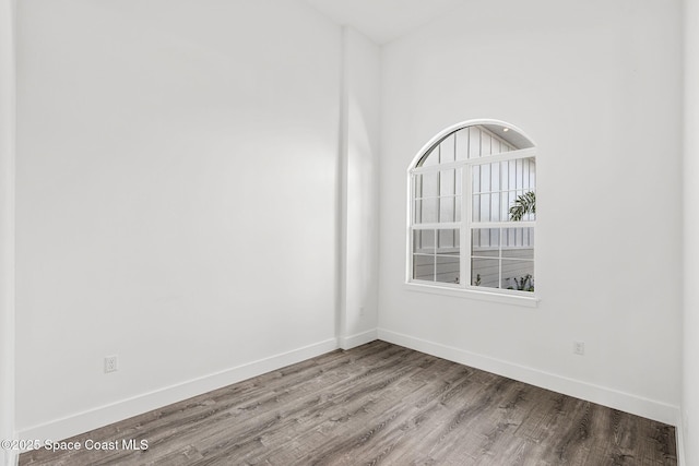 278 Stallion St, Palm Bay, FL 32909 - unfurnished room with wood finished floors and baseboards