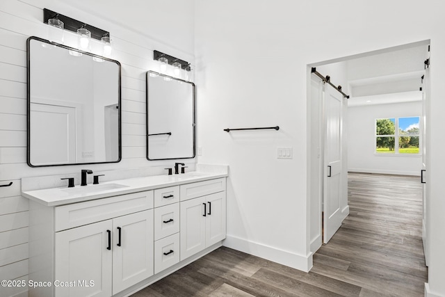 278 Stallion St, Palm Bay, FL 32909 - bathroom featuring wood finished floors and double vanity