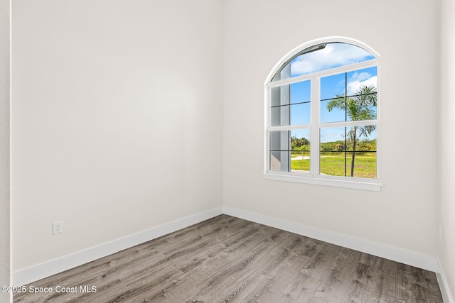 278 Stallion St, Palm Bay, FL 32909 - unfurnished room with wood finished floors and baseboards