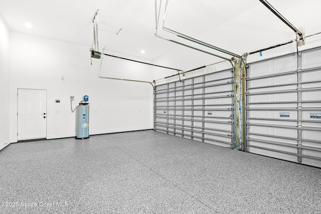 278 Stallion St, Palm Bay, FL 32909 - garage featuring a garage door opener, water heater, and recessed lighting