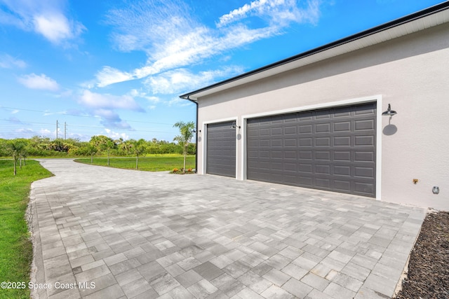 278 Stallion St, Palm Bay, FL 32909 - garage featuring decorative driveway
