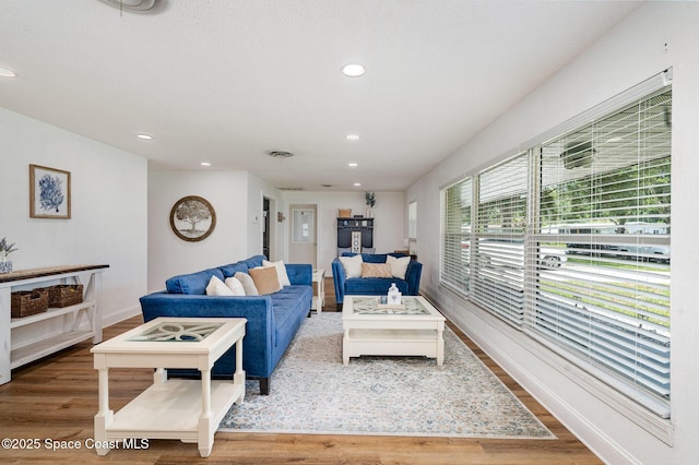 560 Conifer St, Melbourne, FL 32904 - living area with wood finished floors and recessed lighting