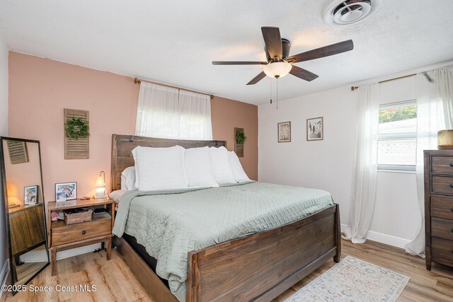 560 Conifer St, Melbourne, FL 32904 - bedroom featuring light wood finished floors and a ceiling fan