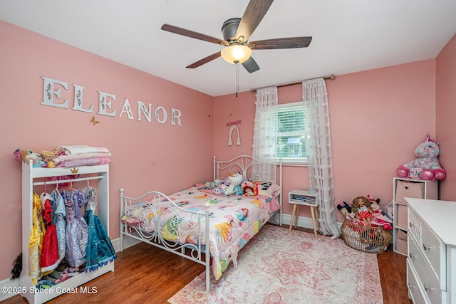 560 Conifer St, Melbourne, FL 32904 - bedroom featuring wood finished floors and a ceiling fan