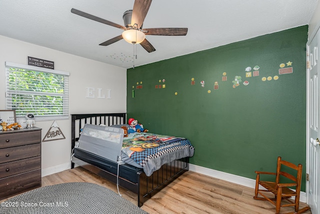 560 Conifer St, Melbourne, FL 32904 - bedroom featuring light wood-style flooring and ceiling fan