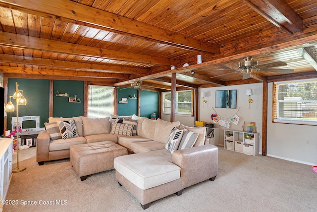 560 Conifer St, Melbourne, FL 32904 - living area featuring a wooden ceiling with exposed beams, light carpet, and a ceiling fan