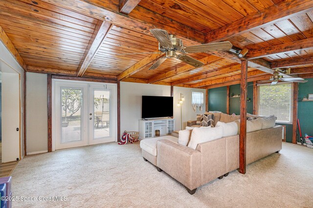 560 Conifer St, Melbourne, FL 32904 - carpeted living room with a wood ceiling with exposed beams, healthy amount of natural light, french doors, and a ceiling fan