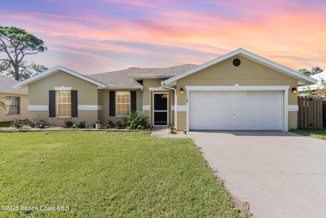 1519 Bronco Dr, Melbourne, FL 32940 - single story home with stucco siding, concrete driveway, a garage, and a shingled roof