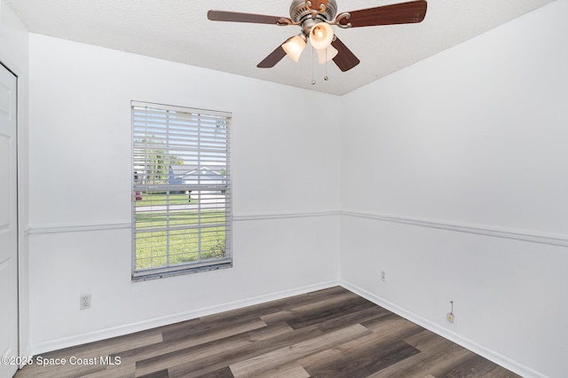 1519 Bronco Dr, Melbourne, FL 32940 - unfurnished room featuring dark wood-style floors and a ceiling fan