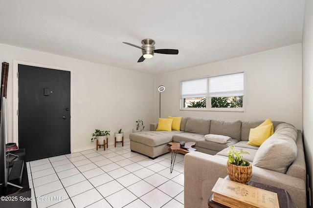 5600 N Banana River Blvd Unit 14, Cocoa Beach, FL 32931 - living area with a ceiling fan and light tile patterned floors