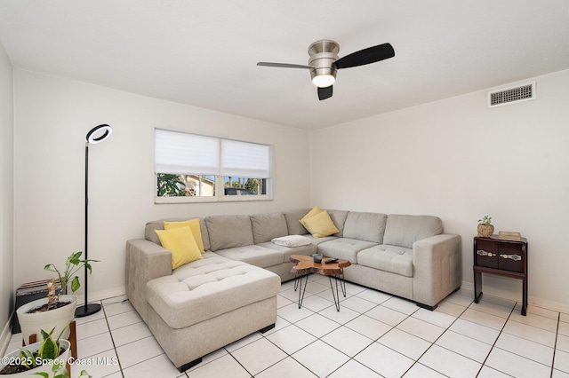 5600 N Banana River Blvd Unit 14, Cocoa Beach, FL 32931 - living room with a ceiling fan and light tile patterned floors