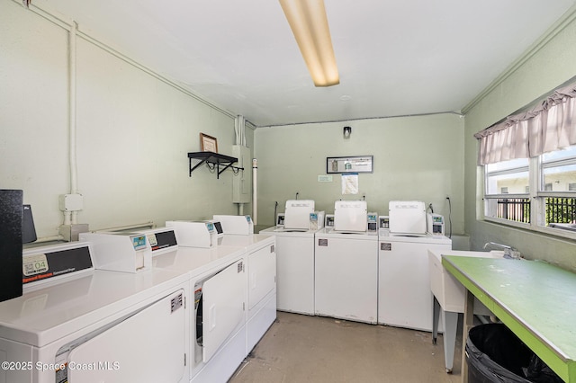 5600 N Banana River Blvd Unit 14, Cocoa Beach, FL 32931 - community laundry room featuring washer and dryer