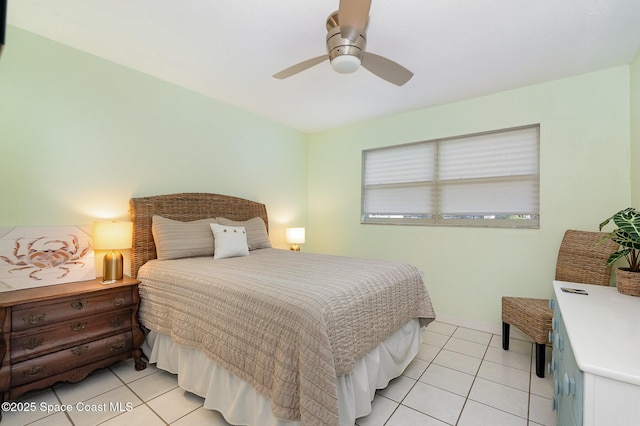 5600 N Banana River Blvd Unit 14, Cocoa Beach, FL 32931 - bedroom featuring light tile patterned floors and a ceiling fan
