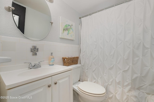 5600 N Banana River Blvd Unit 14, Cocoa Beach, FL 32931 - bathroom with vanity and curtained shower