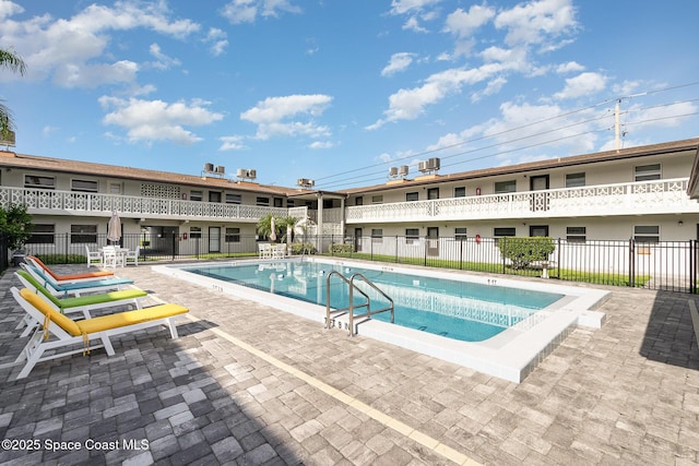 5600 N Banana River Blvd Unit 14, Cocoa Beach, FL 32931 - community pool with a patio area