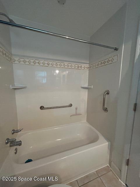 351 Taylor Ave Unit E5, Cape Canaveral, FL 32920 - bathroom featuring tile patterned flooring and shower / washtub combination