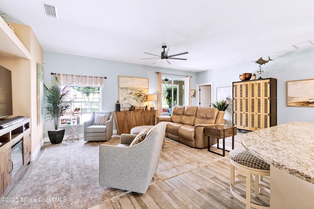 5337 Indigo Crossing Dr, Rockledge, FL 32955 - living room featuring light wood finished floors and ceiling fan