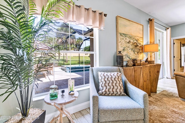 5337 Indigo Crossing Dr, Rockledge, FL 32955 - living area featuring wood finished floors and baseboards