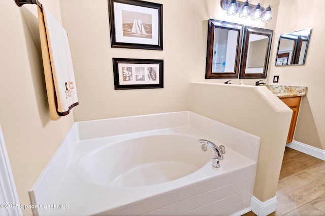 5337 Indigo Crossing Dr, Rockledge, FL 32955 - bathroom with a garden tub and vanity