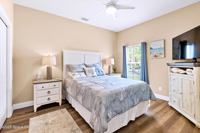 5337 Indigo Crossing Dr, Rockledge, FL 32955 - bedroom with dark wood finished floors and ceiling fan