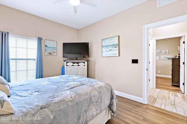 5337 Indigo Crossing Dr, Rockledge, FL 32955 - bedroom with wood finished floors and ceiling fan