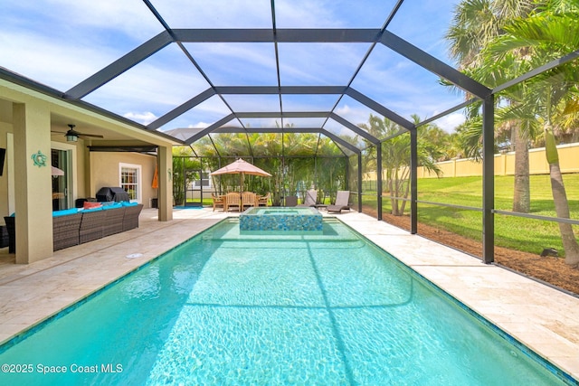 5337 Indigo Crossing Dr, Rockledge, FL 32955 - view of pool with an outdoor hangout area, a ceiling fan, a patio, a yard, and a pool with connected hot tub