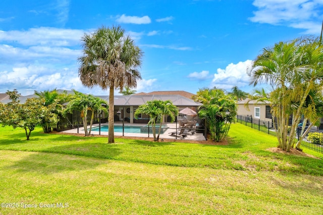 5337 Indigo Crossing Dr, Rockledge, FL 32955 - rear view of property featuring a patio and glass enclosure