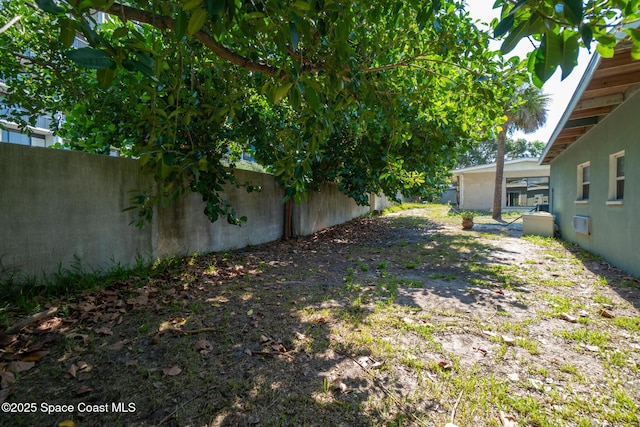 113 Surf Dr, Cocoa Beach, FL 32931 - view of fenced backyard
