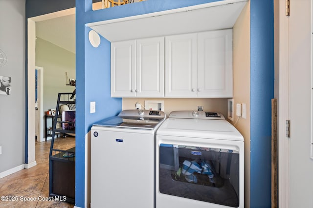113 Surf Dr, Cocoa Beach, FL 32931 - laundry area with cabinet space and washing machine and clothes dryer