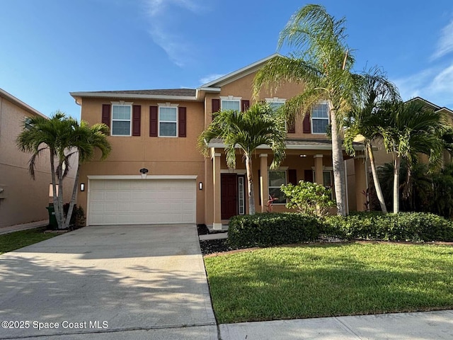 3725 Aria Dr, Melbourne, FL 32904 - traditional home featuring stucco siding, a garage, driveway, and a front lawn