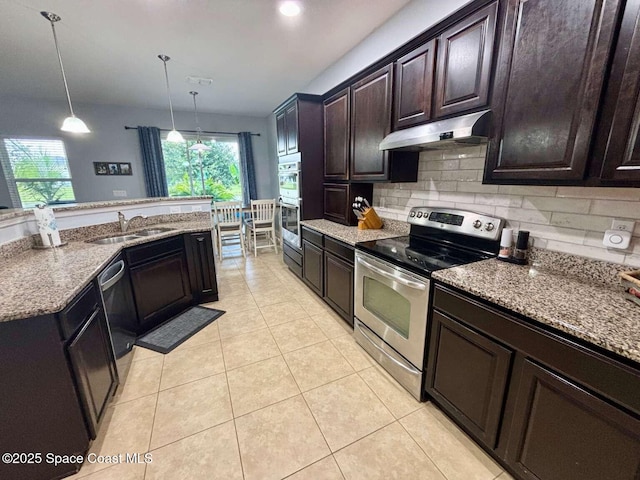 3725 Aria Dr, Melbourne, FL 32904 - kitchen featuring stainless steel appliances, under cabinet range hood, backsplash, and light tile patterned flooring