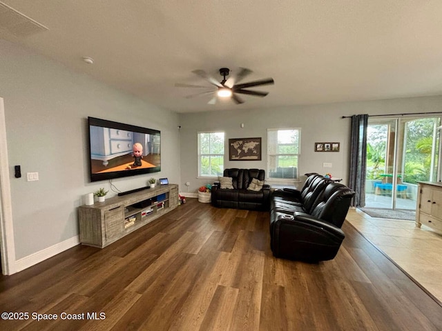 3725 Aria Dr, Melbourne, FL 32904 - living room featuring dark wood-style flooring and ceiling fan