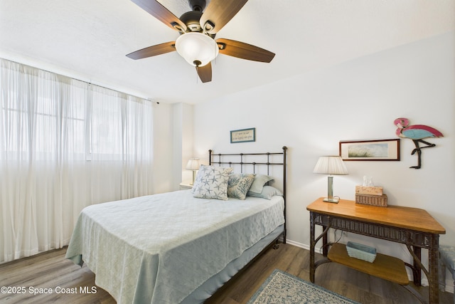 3190 N Atlantic Ave Unit 220, Cocoa Beach, FL 32931 - bedroom with wood finished floors and ceiling fan