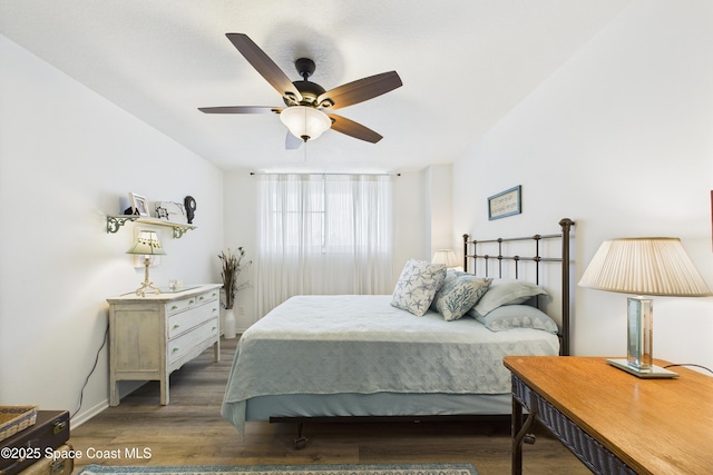 3190 N Atlantic Ave Unit 220, Cocoa Beach, FL 32931 - bedroom featuring wood finished floors and ceiling fan