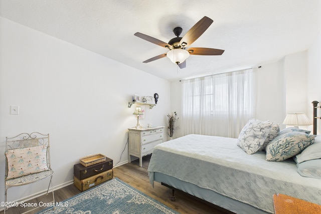 3190 N Atlantic Ave Unit 220, Cocoa Beach, FL 32931 - bedroom with wood finished floors and ceiling fan