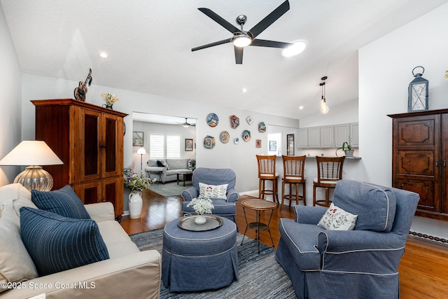 1453 Goldrush Ave, Melbourne, FL 32940 - living room featuring a ceiling fan, vaulted ceiling, light wood finished floors, and recessed lighting
