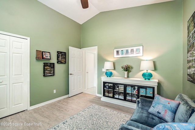 1453 Goldrush Ave, Melbourne, FL 32940 - sitting room featuring ceiling fan, high vaulted ceiling, and wood finished floors