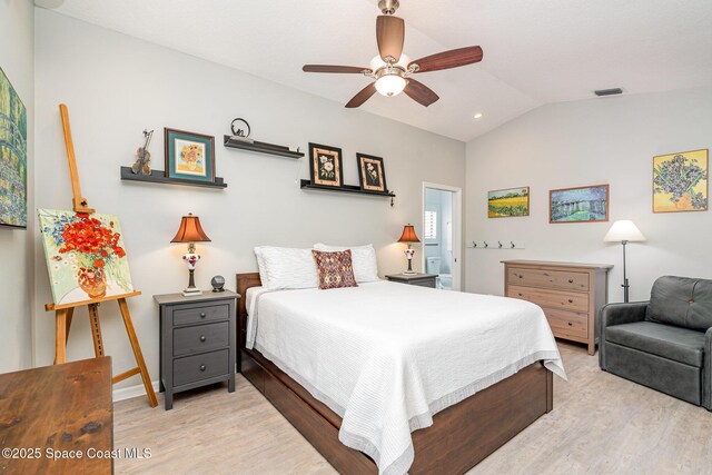 1453 Goldrush Ave, Melbourne, FL 32940 - bedroom with light wood-type flooring, vaulted ceiling, and ceiling fan