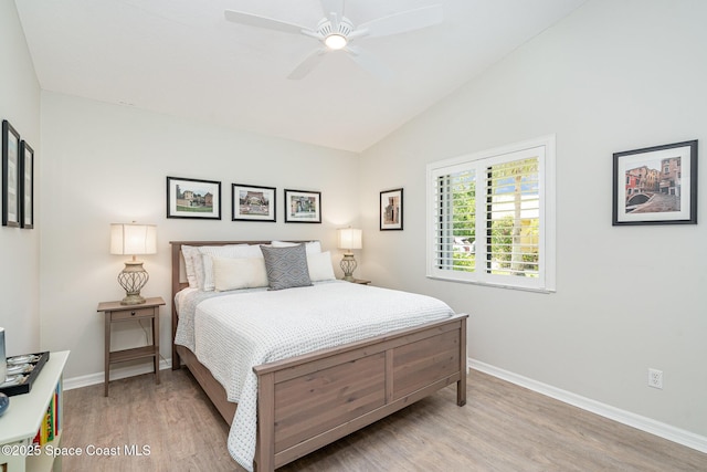1453 Goldrush Ave, Melbourne, FL 32940 - bedroom featuring wood finished floors, high vaulted ceiling, and ceiling fan