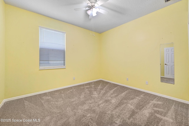 4490 Portage Trl, Melbourne, FL 32940 - carpeted empty room with ceiling fan and baseboards