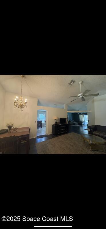 4094 Wilkes Dr, Melbourne, FL 32901 - kitchen with ceiling fan and a chandelier