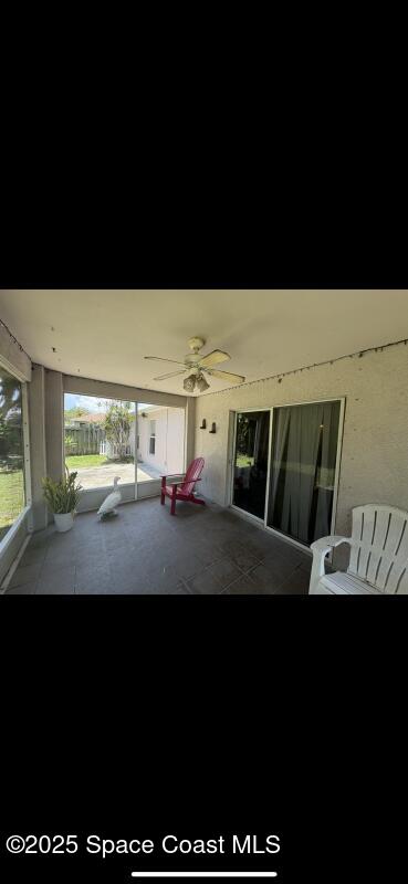 4094 Wilkes Dr, Melbourne, FL 32901 - view of patio with ceiling fan