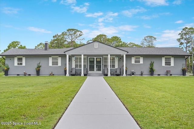 3440 Pine St, Cocoa, FL 32926 - ranch-style house featuring a front yard, stucco siding, and a chimney