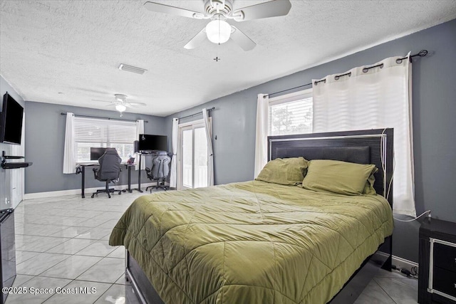 3440 Pine St, Cocoa, FL 32926 - bedroom with a desk, a textured ceiling, and ceiling fan