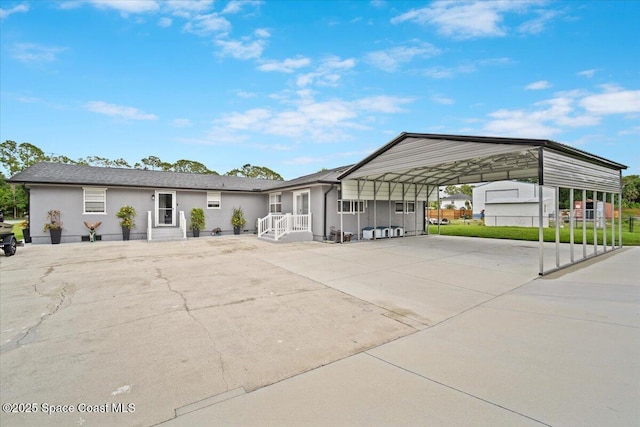 3440 Pine St, Cocoa, FL 32926 - view of parking with driveway and a carport
