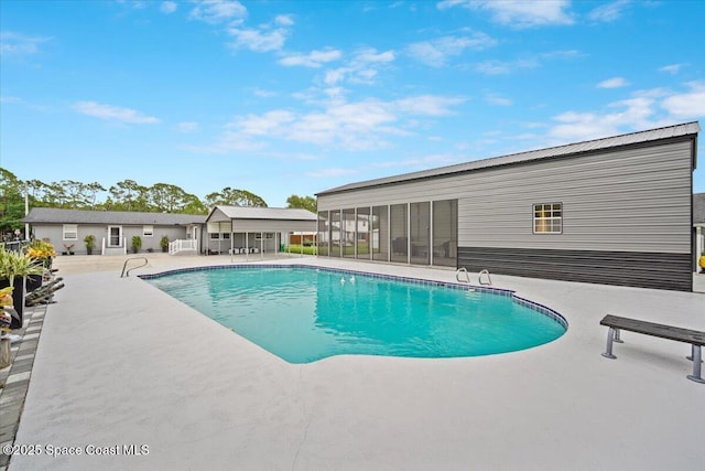 3440 Pine St, Cocoa, FL 32926 - outdoor pool featuring a sunroom and a patio