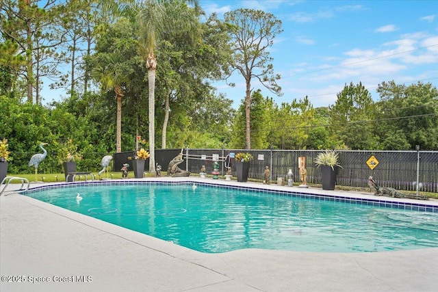 3440 Pine St, Cocoa, FL 32926 - view of pool featuring view of wooded area and a patio area