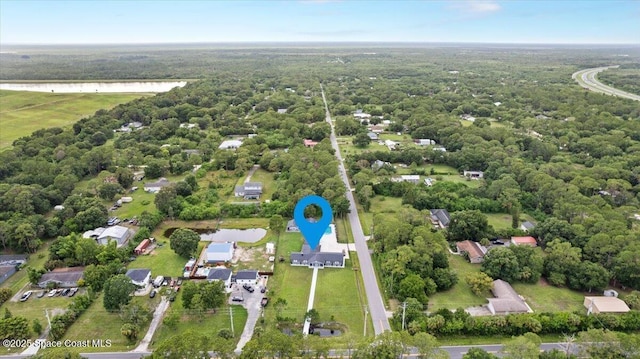 3440 Pine St, Cocoa, FL 32926 - aerial view of property's location featuring a nearby body of water and a forest