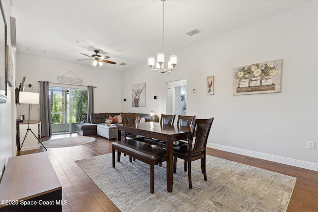 4107 Meander Pl Unit 104, Rockledge, FL 32955 - dining area with hardwood / wood-style flooring, a ceiling fan, and a chandelier